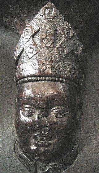 Part of a misericord in a Chancel stall in St. Margaret's Church, King's Lynn. A 14th-century carving of Henry le Despenser, the victor of the Battle of North Walsham.